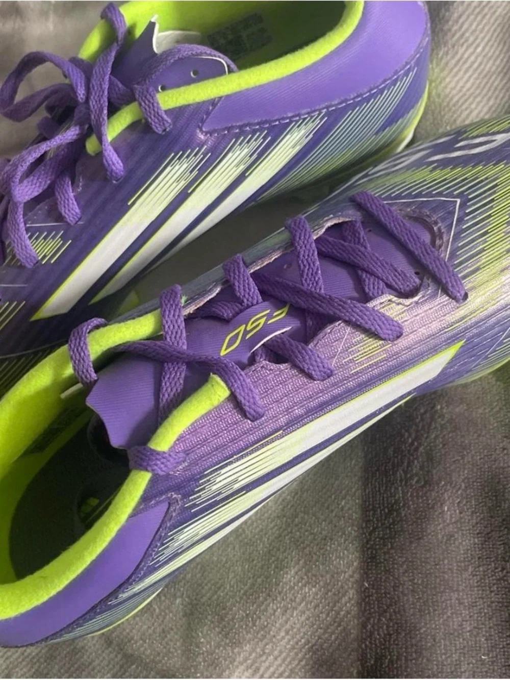adidas Women’s Purple & Neon Green Athletic Cleats
